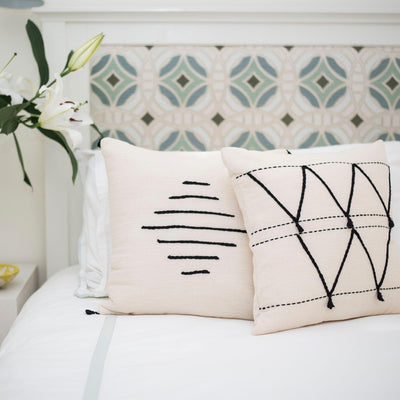 Tunis Rustic Cream Throw Pillows in bed- 54kibo